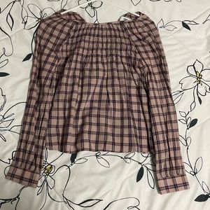 Printed purple blouse.